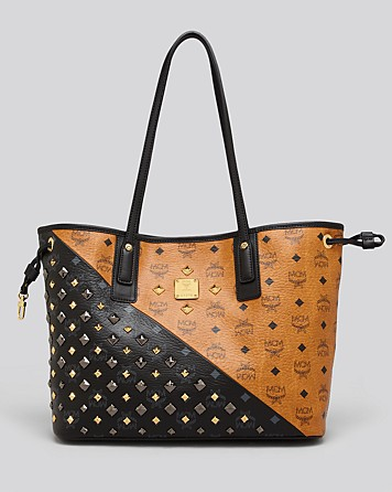 Illustration for article titled Handbag Inanity